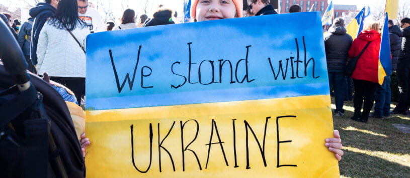 February 27, 2022 - Washington, DC, United States: Young girl holding a sign saying "We stand with Ukraine" at a "Stand With Ukraine" rally.