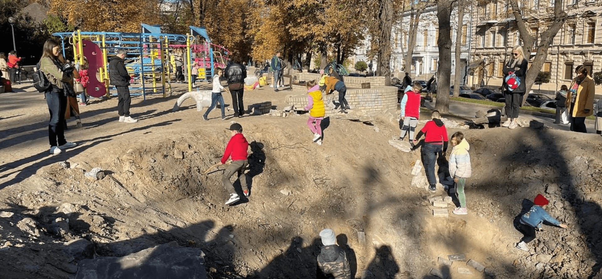 kids and adults in playground