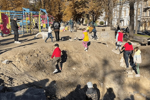 kids and adults in playground